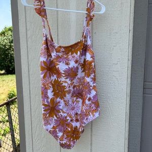 Women’s one piece bathing suit with floral design